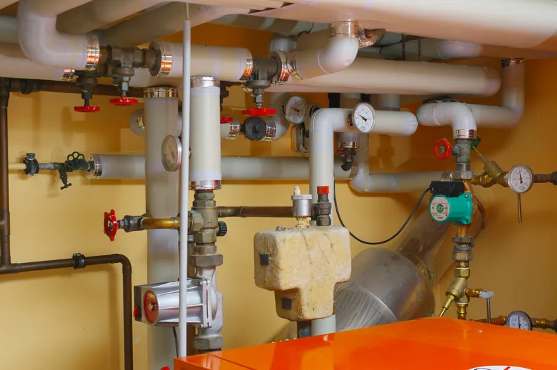 Pipework, valves and gauges in a plant room